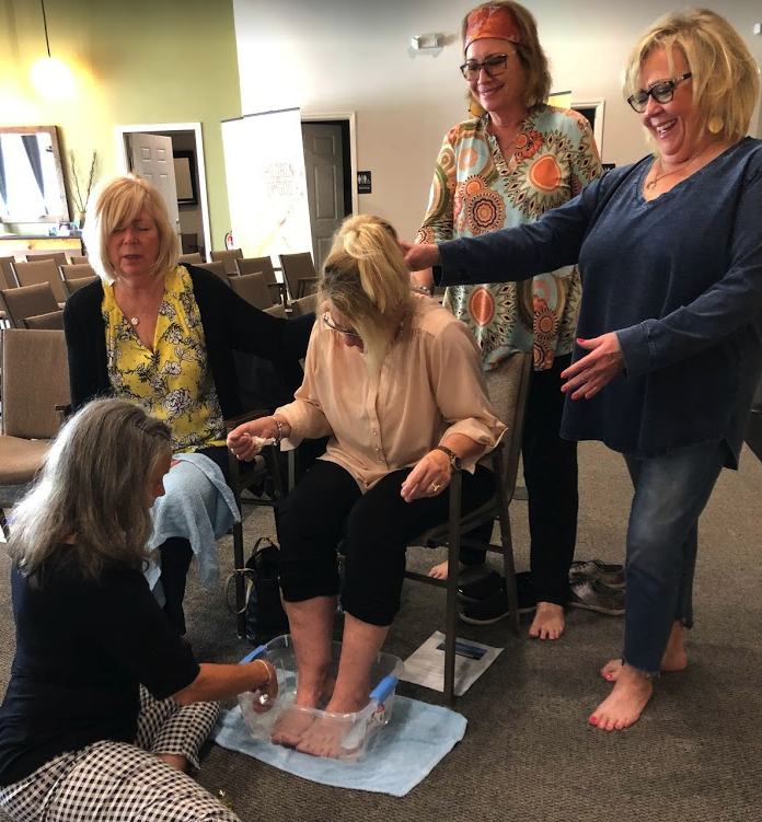 A foot-washing service at The Well of Nashville