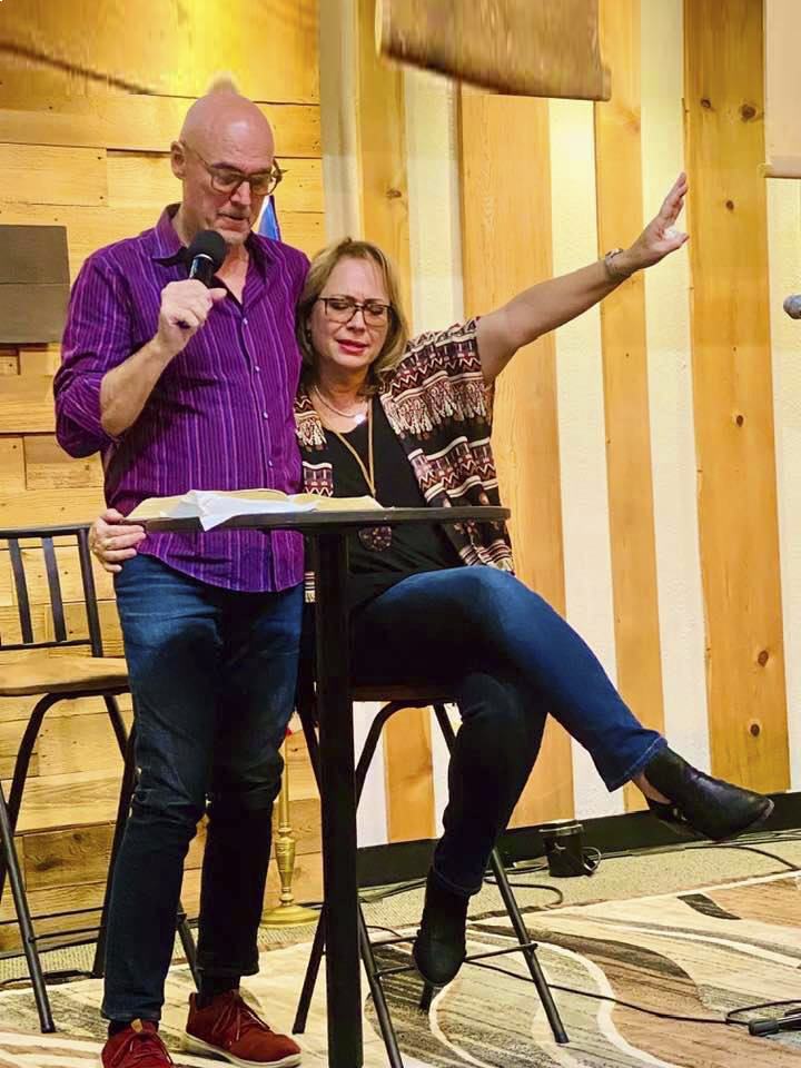 Pastors Carl and Leann Albrecht leading a gathering at The Well of Nashville
